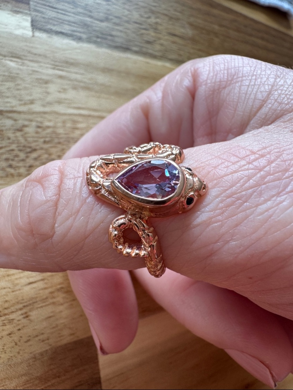 Rose Gold Serpent Ring with Purple Teardrop Stone